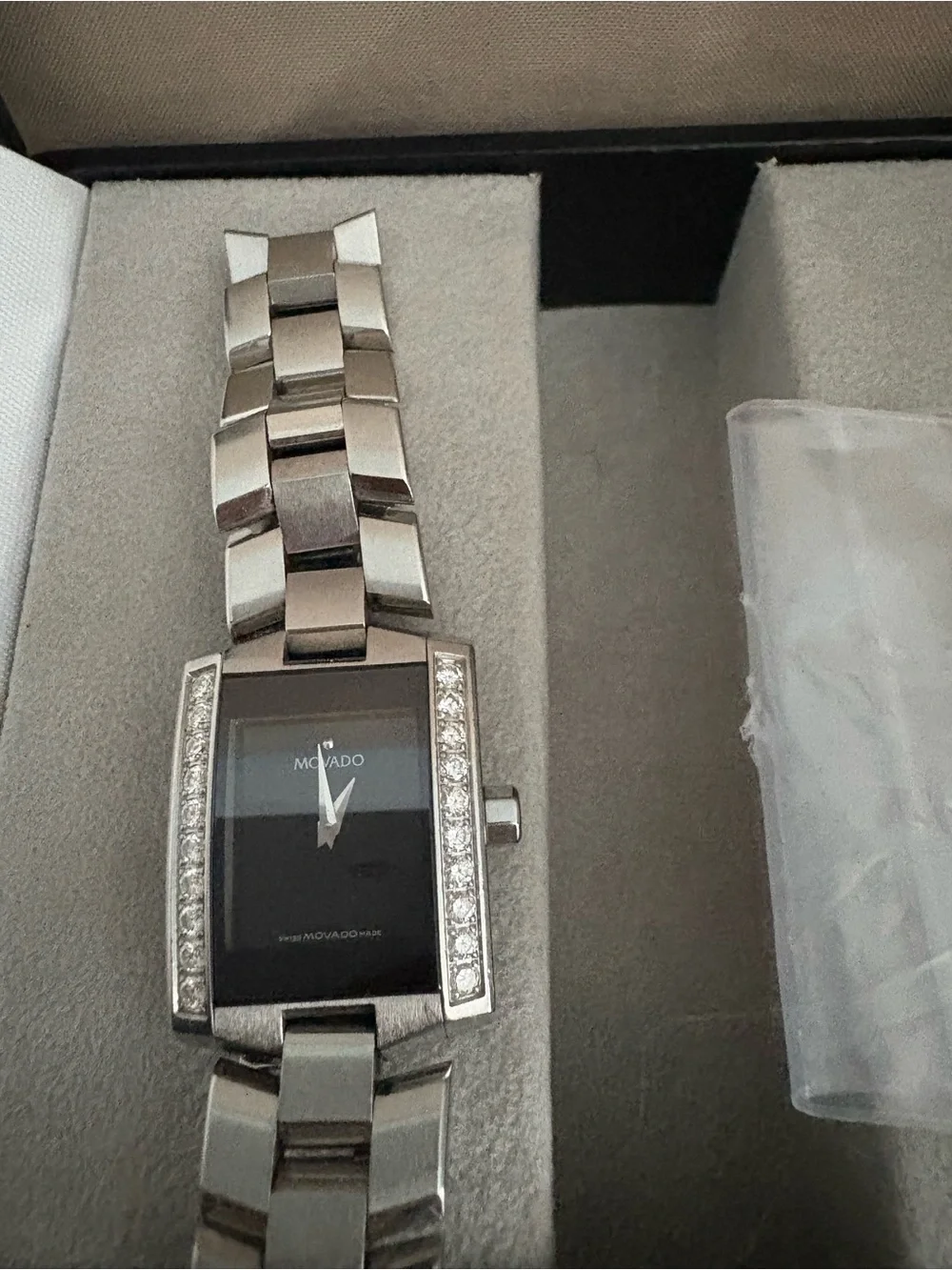 Movado Sterling Silver Watch with Rectangular sapphire crystal dial & diamonds